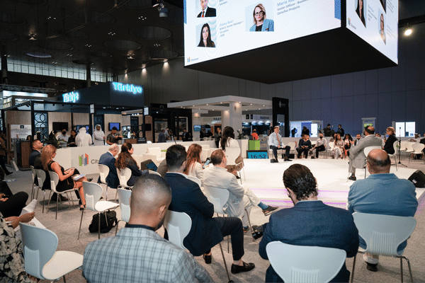 Attendees sitting at a talk